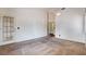 Bedroom with neutral carpet, door to outside, and good light at 4612 Standing Bluff Way, Las Vegas, NV 89130