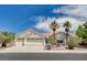 Charming single-story home featuring a tile roof, desert landscaping, and an attached three-car garage at 4612 Standing Bluff Way, Las Vegas, NV 89130