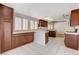 Spacious kitchen features tile floors, wood cabinets, and natural light at 4612 Standing Bluff Way, Las Vegas, NV 89130