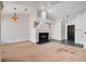 Living room with fireplace, and an open layout towards the entryway and other rooms at 4612 Standing Bluff Way, Las Vegas, NV 89130