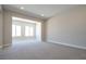 Large living room featuring neutral tones, recessed lighting, and ample space for furniture at 4630 Blushing Dawn Ave, Las Vegas, NV 89118