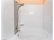Bright bathroom featuring a soaking tub with white subway tile surround and modern fixtures at 4837 River Splash Ave, Las Vegas, NV 89131