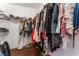 Walk-in closet with ample storage space for clothes, shoes, and accessories at 4837 River Splash Ave, Las Vegas, NV 89131