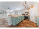 Bright kitchen and living area with modern appliances and tiled floor at 4837 River Splash Ave, Las Vegas, NV 89131