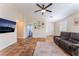 Bright living room with tile flooring, neutral walls, and ample space for entertaining at 4837 River Splash Ave, Las Vegas, NV 89131