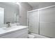 Modern bathroom features sleek countertop, sink and shower at 5219 Caliente St # 11, Las Vegas, NV 89119
