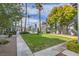 Well-maintained community grounds with lush landscaping and mature trees at 5219 Caliente St # 11, Las Vegas, NV 89119