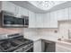 Bright kitchen featuring stainless appliances, gas range, and updated countertops at 5219 Caliente St # 11, Las Vegas, NV 89119