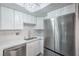 Updated kitchen with stainless steel appliances, countertops, and ample cabinet space at 5219 Caliente St # 11, Las Vegas, NV 89119