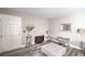 Living room shows white door, hardwood floors and a sitting area at 5219 Caliente St # 11, Las Vegas, NV 89119