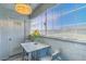 Cozy enclosed patio featuring a table, chairs, and ample natural light at 5219 Caliente St # 11, Las Vegas, NV 89119