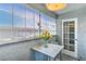 Enclosed patio with bright light and relaxing seating space at 5219 Caliente St # 11, Las Vegas, NV 89119