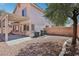 Backyard image featuring a covered patio, landscaping and block wall at 575 Aspen Leaf St, Las Vegas, NV 89144