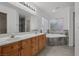 Bright bathroom featuring a double sink vanity and luxurious soaking tub at 575 Aspen Leaf St, Las Vegas, NV 89144