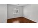 Cozy bedroom with laminate flooring, and a window for natural light at 575 Aspen Leaf St, Las Vegas, NV 89144