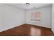 This bedroom features laminate flooring and a window providing natural light at 575 Aspen Leaf St, Las Vegas, NV 89144