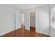 Bedroom with wood floors and open closet space at 575 Aspen Leaf St, Las Vegas, NV 89144