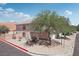 Charming two-story home featuring a low maintenance rock yard and mature desert landscaping in a suburban neighborhood at 575 Aspen Leaf St, Las Vegas, NV 89144