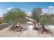 View of two-story home with a driveway and xeriscaping at 575 Aspen Leaf St, Las Vegas, NV 89144