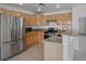 Bright kitchen features granite countertops and stainless steel appliances at 575 Aspen Leaf St, Las Vegas, NV 89144