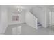 Open living room space with stairs to second floor at 575 Aspen Leaf St, Las Vegas, NV 89144