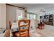 Comfortable dining room adjacent to the living room with ample seating at 5896 Shining Moon Ct, Las Vegas, NV 89131