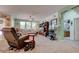 Inviting living room with a large window and an open layout to adjacent rooms at 5896 Shining Moon Ct, Las Vegas, NV 89131