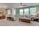 Bright living room with a cozy seating area with a plush sofa and armchair, perfect for relaxation and entertaining at 5896 Shining Moon Ct, Las Vegas, NV 89131