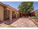 Spacious patio with covered area, lush landscaping, and easy access to the home at 5896 Shining Moon Ct, Las Vegas, NV 89131