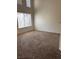 Sun-drenched bedroom with a large window at 59 Belle Maison Ave, Las Vegas, NV 89123
