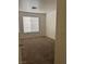 Bedroom with a large window letting in natural light at 59 Belle Maison Ave, Las Vegas, NV 89123