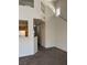 Open-concept living area, highlighting natural light and kitchen access at 59 Belle Maison Ave, Las Vegas, NV 89123