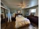 Cozy bedroom with a ceiling fan, a dresser, and a comfortable-looking bed at 632 Tam O Shanter, Las Vegas, NV 89109