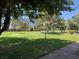 Lush green golf course with mature trees and a building in the distance at 632 Tam O Shanter, Las Vegas, NV 89109