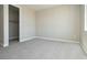 Bedroom with neutral carpet, baseboards, neutral paint and a closet at 7199 Twilight Rider Ct, Las Vegas, NV 89118