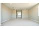Large bonus room with neutral carpet, recessed lighting, and a double door entrance at 7199 Twilight Rider Ct, Las Vegas, NV 89118