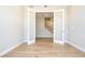 Office space with French doors, recessed lighting, and wood-look floors; ideal for working remotely at 7199 Twilight Rider Ct, Las Vegas, NV 89118