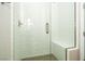 Stylish shower with glass door, built-in bench, and modern tile at 7199 Twilight Rider Ct, Las Vegas, NV 89118