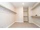 Walk-in closet with carpet and shelving for storage and organization at 7199 Twilight Rider Ct, Las Vegas, NV 89118