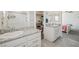 Bright bathroom featuring double sinks, granite countertop, and walk-in shower at 7730 Moore Creek Ln, North Las Vegas, NV 89084