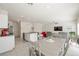Spacious open-concept living room and kitchen, perfect for gatherings and everyday living at 7730 Moore Creek Ln, North Las Vegas, NV 89084
