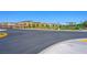 Neighborhood entrance with community playground and well-maintained street at 7730 Moore Creek Ln, North Las Vegas, NV 89084