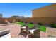 Inviting patio with elegant outdoor seating, perfect for relaxation and entertainment at 7730 Moore Creek Ln, North Las Vegas, NV 89084