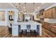 Large kitchen with an oversized island, breakfast bar and stainless steel appliances at 8010 Palm Cove Ct, Las Vegas, NV 89129