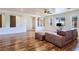 Bright living room with hardwood floors, neutral walls, and ample natural light at 8010 Palm Cove Ct, Las Vegas, NV 89129