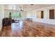 Open living room featuring hardwood floors and lots of natural light at 8010 Palm Cove Ct, Las Vegas, NV 89129