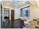 Spa-like main bathroom with a clawfoot tub, natural light, stone floors, and luxury finishes at 8010 Palm Cove Ct, Las Vegas, NV 89129
