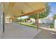 Covered patio and grassy backyard at 814 Singing Drum Dr, Henderson, NV 89002