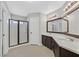 Bathroom featuring double sink vanity and walk in shower at 814 Singing Drum Dr, Henderson, NV 89002