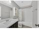 Bathroom featuring a single sink vanity and a shower-tub combo at 814 Singing Drum Dr, Henderson, NV 89002